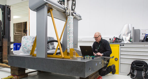 A seamless coordinate measuring machine (CMM) installation