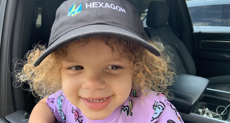 Alaina Lewis in a Hexagon baseball cap