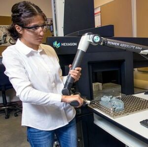 Student at Fullerton College using portable measuring arm from Hexagon.