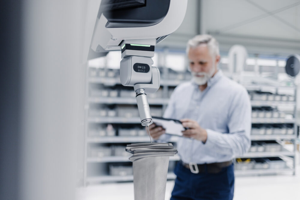an automated coordinate measurement machine (CMM)