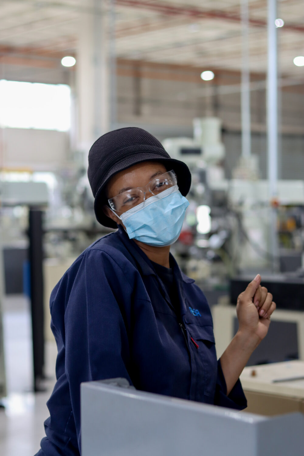 Worker at machine shop in South Africa